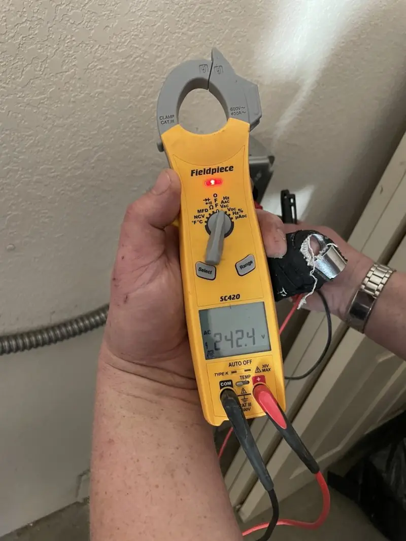 Voltage testing with clamp meter during Generator Installation in West Salem